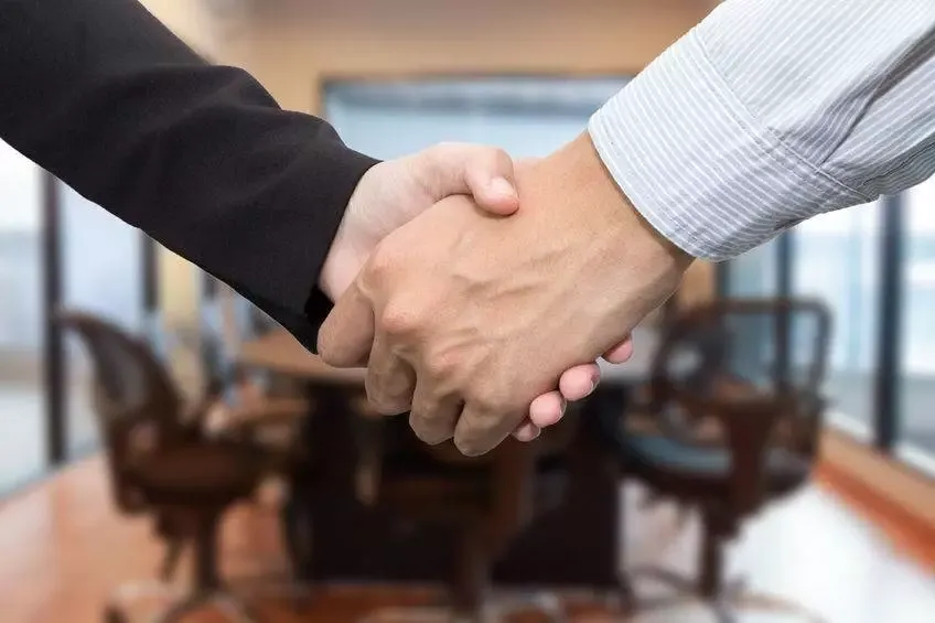 Close up of a handshake