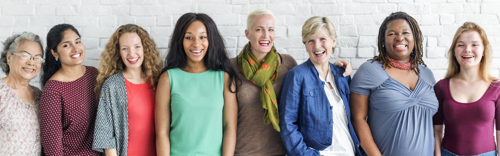 group of eight women smiling